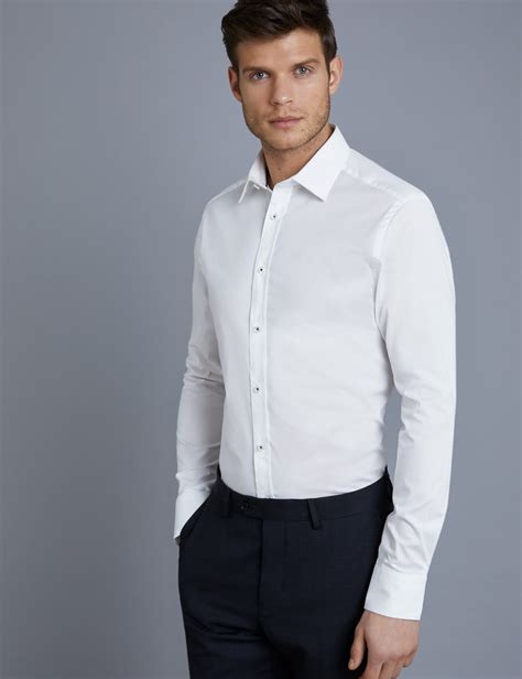 White dress shirt men. Mens dress shirts from Haggar will sharpen you up with a range of button up shirts. Explore our selection of mens business shirts & save 15% off your order! ... Smart Wash™ Tall Dress Shirt - White Classic Fit Sale Price $49.99 Standard Price $65.00 Original Price $65.00. Classic Fit New. Premium Comfort Big Dress Shirt … 