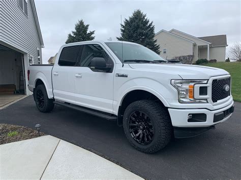 White f150 leveled on 33s. 2021 Ford F150 Lariat Sport Covert Edition Leveled on 34s ... 