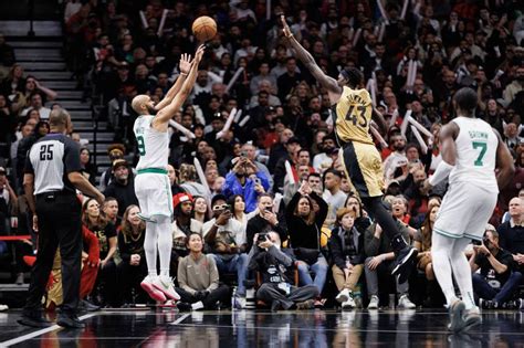 White hits tiebreaking 3, Celtics hold on to beat Raptors 108-105 in tournament game