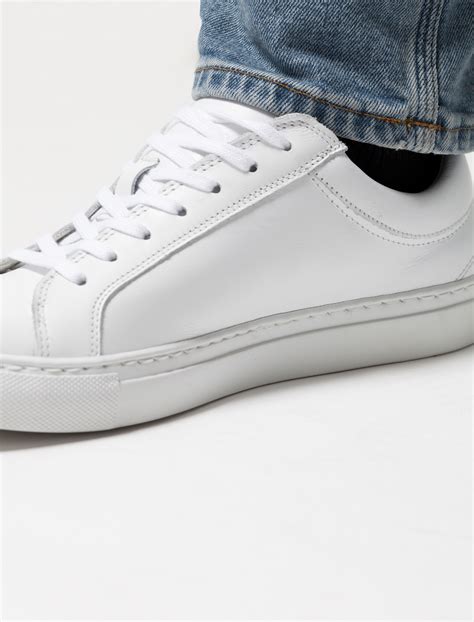 White leather sneakers men. Designed to combine minimalist lines and luxury with the high-end structure and quality Northampton is renowned for. The Sneaker Collection is handmade with first-grade suede and leather uppers sourced from the finest tanneries around the world including the Horween Company and C F Stead. Fully leather lined, we use a high rand thermoplastic ... 