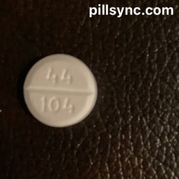 Round White Pill 44 159. Size: 13 mm. What it is: Acetaminophen 250 MG / Aspirin 250 MG / Caffeine 65 MG. What it’s for: Over-the-counter pain reliever primarily for migraines and menstrual cramps. Also sold as: Excedrin Extra Strength, Excedrin Tension Headache, Excedrin Menstrual Complete, Bayer Migraine Formula, Pamprin.
