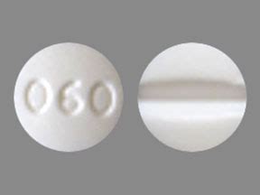 Pill with imprint 060 is White, Round and has been identified as Clonidine Hydrochloride Extended Release 0.1 mg. It is supplied by Mayne Pharma Inc. Clonidine is used in the treatment of ADHD; High Blood Pressure; Pain and belongs to the drug class antiadrenergic agents, centrally acting . Risk cannot be ruled out during pregnancy.