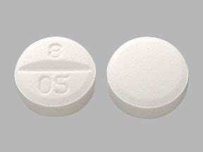 B Pill - white round, 5mm . Pill with impri