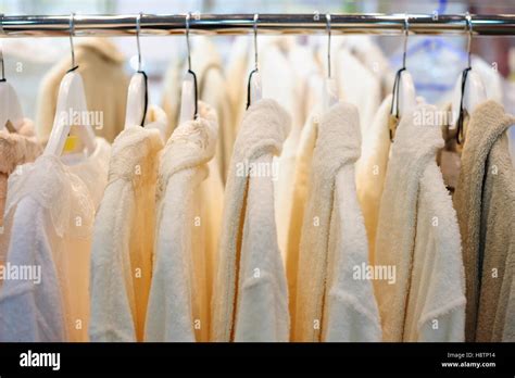 White shirt on hanger Stock Photos and Images - Alamy