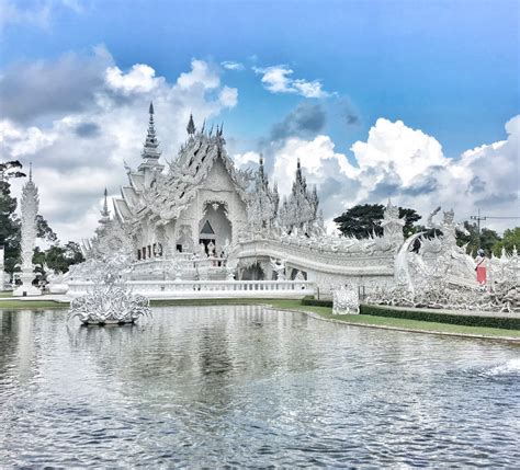 White temple chiang rai thailand. Here are 15 fascinating facts about Wat Rong Khun, also known as the White Temple: Origin: Wat Rong Khun is a contemporary Buddhist temple in Chiang Rai, Thailand, renowned for its stunning white architecture and intricate design. Founder: The temple was conceptualized and founded by Chalermchai Kositpipat, a prominent Thai visual artist, in 1997. 