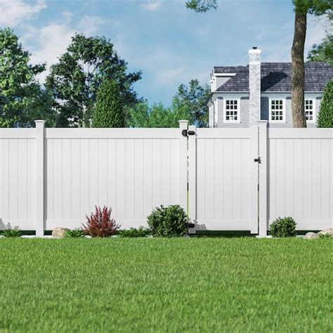 White vinyl fence panels.  Weatherproof, maintenance-free, and available i...