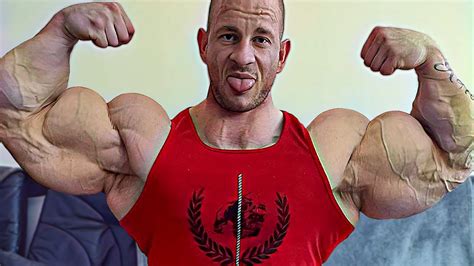 th?q=Who Has the Biggest Arms in Bodybuilding? - Muscle and Brawn