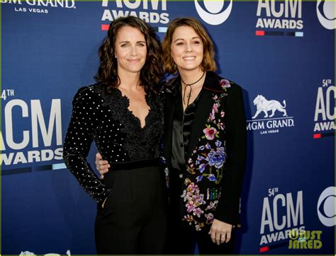 Carlile and her wife Catherine have two daughters and live on a compound in the state of Washington with the Hanseroth twins and their children. Phil Hanseroth Roth is married to Carlile's younger sister Tiffany. Carlile's cellist is married to Catherine's sister. Brandi Carlile's new memoir is called "Broken Horses.". 