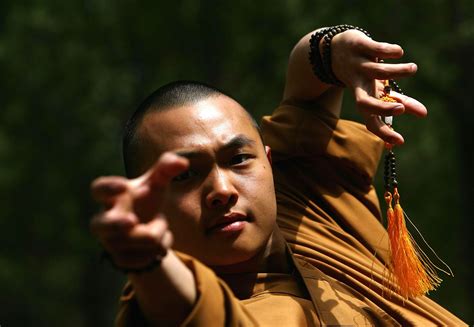 Why are Shaolin monks versed in martial arts, if Buddhist beliefs ...