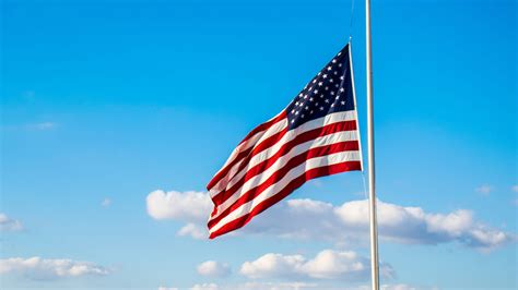 Why are flags at half-staff in Colorado?