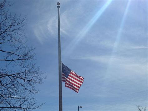 Why are flags at half-staff on Tuesday, Dec. 19?