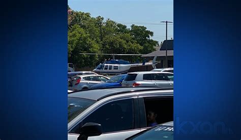 Why did a private helicopter land multiple times in a north Austin parking lot?