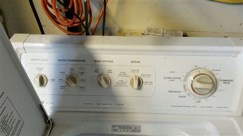 Why is my Kenmore 800 washer not completing the spin cycle?