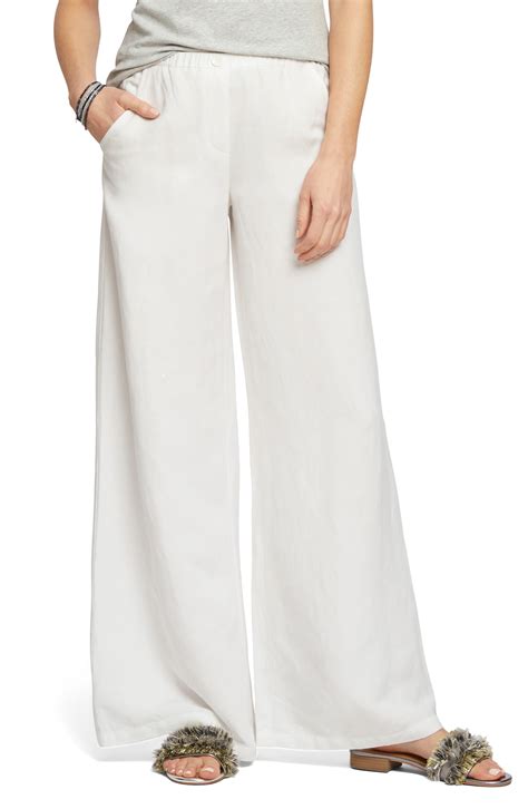 Wide linen blend trousers. Aug 1, 2023 · Linen Blend Pleated Wide Leg Trousers. £79 at Marks & Spencer. Credit: M&S. Go bold with these "lipstick" coloured trousers. Advertisement - Continue Reading Below. 4. H&M Linen Joggers. 4. 