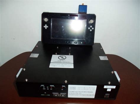 Wii u dev kit.  It connects to a host computer over a network to facilitate application deve...