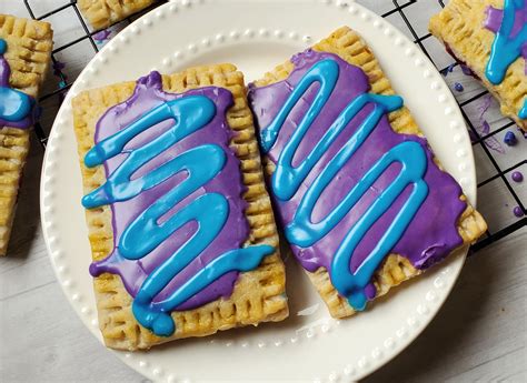 Wild berry poptart. To Finish. 1 Heat the oven to 350 degrees F. 2 In a large bowl, toss the blueberries and strawberries with sugar, zest and juice of one lime, and the 2 tablespoons of flour. Spoon into the tart shell then dot pieces of butter over the top. 
