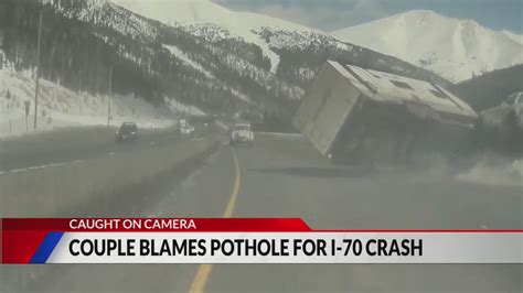 Wild crash, allegedly caused by I-70 pothole, caught on camera