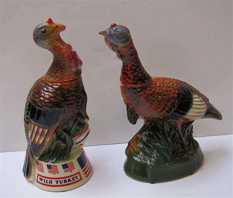 Wild turkey decanters. Wild Turkey and Raccoon decanter #5 from 1984 Empty. No chips in porcelain. Cork in stopper has dry-rotted and broken. 