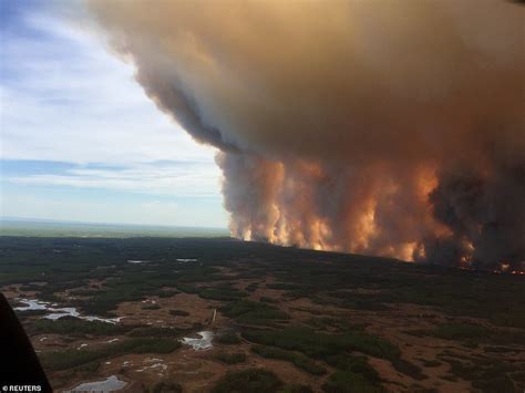 Wildfires continue in Alberta as premier, prime minister are set to talk