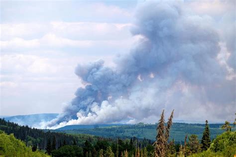 Wildfires in Canada have broken records for area burned, evacuations and cost, official says