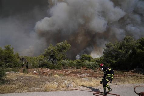 Wildfires in Greece close highways and threaten an oil refinery, as the EU sends firefighting planes