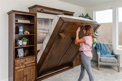 Wilding wallbeds. Brandon from our St. George, Utah showroom demonstrates the popular Murphy Desk Bed. The model shown in this video is a Queen size Paris style in Oak wood wi... 
