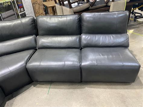 Williamton Leather Modular Power Reclining Sectional Color: Gray; Top Grain Leather with Vinyl Match on Sides and Back; Modular Design Allows for Multiple configurations; Attached Adjustable Lumbar Pillow and Can Shift to Provide Ideal Lower Back Support (3) USB ports. 