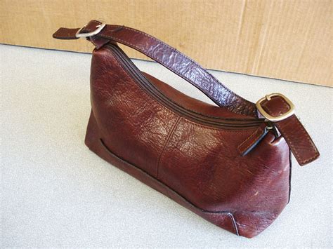 Adventure Bound WILSONS Leather Saddle Brown Crossbody Purse. $21.99. $4.95 shipping. or Best Offer. Vintage Wilsons Leather Convertible Small Crossbody Clutch Wallet ... . 