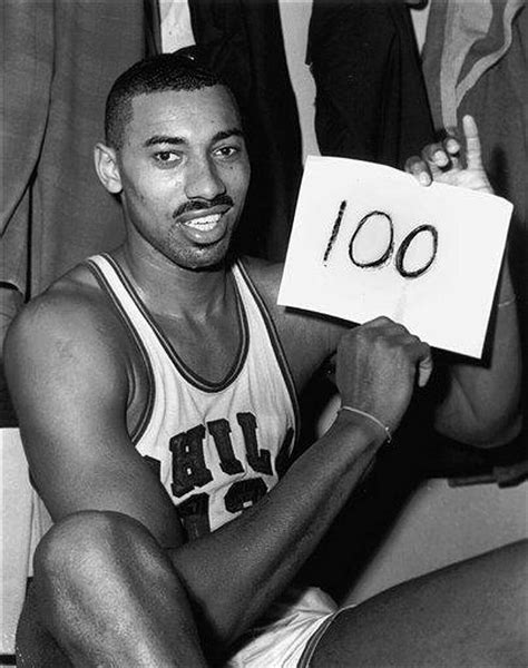 NBA legend Wilt Chamberlain holds the re