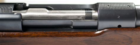 The best way to identify a pre-1964 Model 70 Winchester rifles is the serial number and the fore-end screw to secure the barrel to the stock. Model 70 rifles with serial numbers below 700,000 are the pre-1964 variety. . 