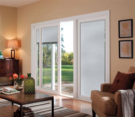 Window covering ideas for sliding glass doors. These are beautiful window treatments for sliding glass doors. 2. Vertical Blinds. Bali Fabric Vertical Blinds with Cord and Chain Control and Square Corner Valance: Keepsake, Golden Years 0172. Vertical blinds are classic sliding glass door blinds. You can find them in wood, fabric, and vinyl for a variety of looks. 