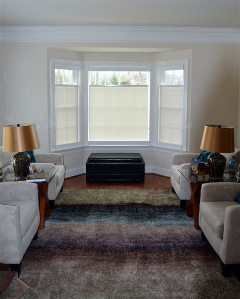 Window coverings for bay windows. A bay window consists of three windows that are positioned to each other in an angled shape, whereas a bow window consists of four or more windows arranged in a curved shape. Window treatments for bay and bow windows are usually standard rectangular installations that are positioned to mimic the angled or curved shape of these types of windows. 