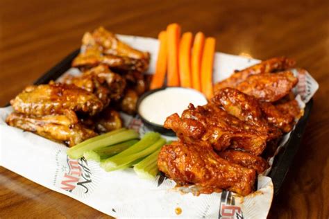 Wing nutz. Wingnutz has quickly grown into an international wing destination. In 2005 Ed and Alicia set out to make the best wings in the world. Focusing on size, sauciness, and crunch they created the best wings in the world worthy of Buffalo, NY. Read Our Article About Their Opening 