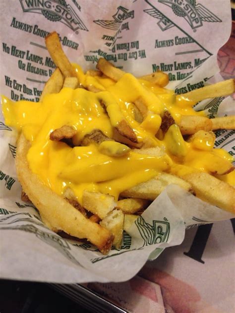 Wingstop cheese fries. There are 470 calories in 1 order (6 oz) of Wingstop Cheese Fries. You'd need to walk 131 minutes to burn 470 calories. Visit CalorieKing to see calorie count and nutrient data for all portion sizes. 