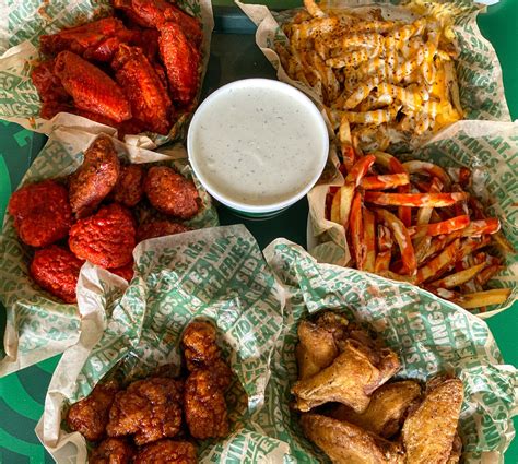 Choose between four sauces: a hot-honey barbecue, tangy buffalo, a house-made dry rub, and the lemon pepper curry dry rub. (Heat lovers should opt for the latter.) Open in Google Maps. Foursquare. 355 Monroe St NE, Minneapolis, MN 55413. (612) 627-9123. Visit Website. Wings from Spring Spreet. Spring Street Tavern.
