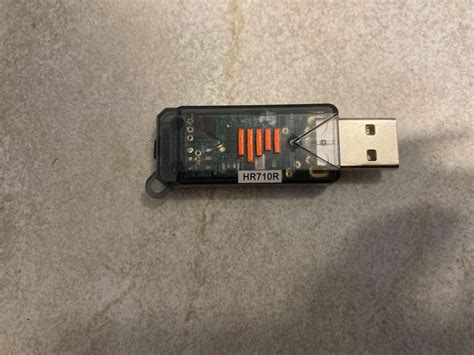 Wireless simulator usb dongle.  The dongle LED will glow solid orange when the...