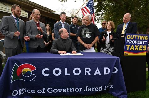 With Gov. Jared Polis’ signature, next phase of fight over property taxes takes shape