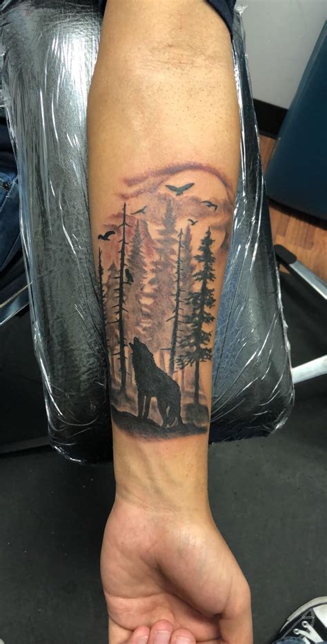 Wolf in woods (first tat), done by Natalie DS at Witch Doctor Tattoo in