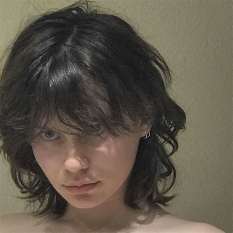 This style is called a butterfly haircut, inspired by the 90s. It was created to frame the eyes and cheekbones. This option is great for anyone looking to add face-framing to your mid to long-length haircut. A wolf cut without bangs is also achievable if you ask for a longer face frame. Instagram @yudai224.