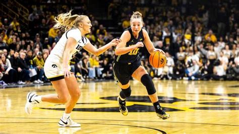 Wolverines Drop a Pair in High-Scoring Affair - University of …