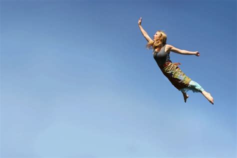 Woman Flying Photos and Premium High Res Pictures