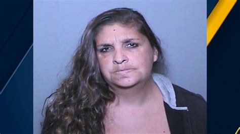Woman accused of appearing in sexually explicit videos with child