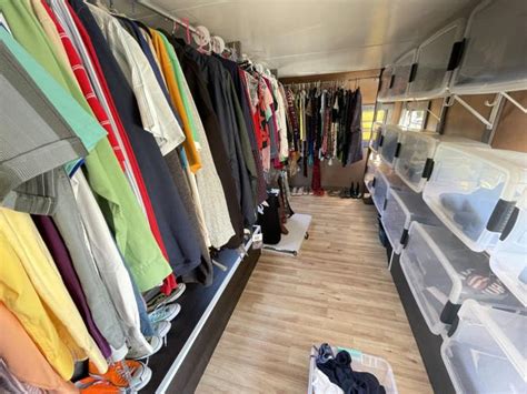 Woman delivers clothes to needy from refurbished camper