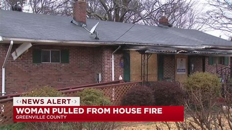 Woman pulled from burning home in Quincy