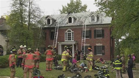 Woman saved off roof of burning house in Webster Groves