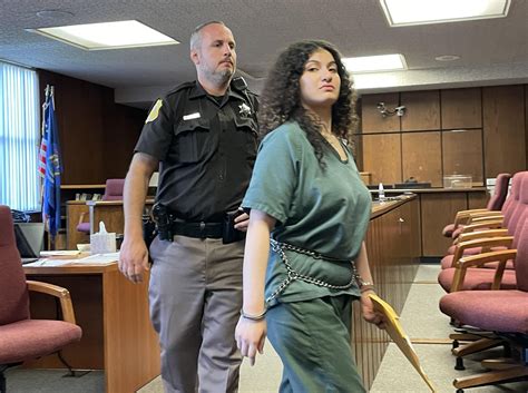 Woman sentenced to life in prison for stabbing her 4 children to