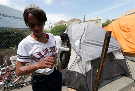 Woman shot at Oakland homeless camp