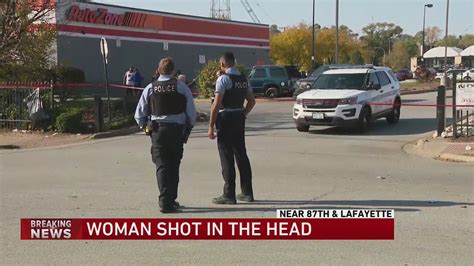 Woman shot in head near South Side strip mall