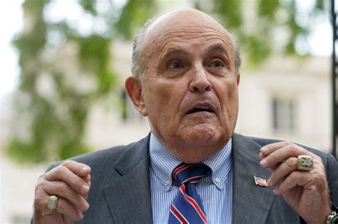 Woman sues Giuliani, alleging sex coercion, says she’s owed $2M