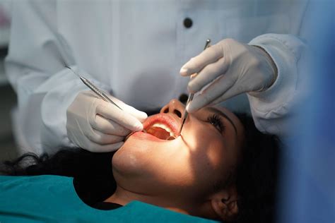 Woman sues dentist after 4 root canals, 8 dental crowns and 20 fillings in a single visit